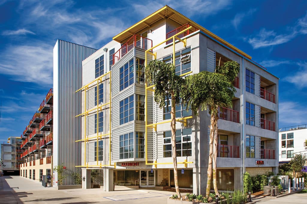 Element’s façade attracts attention with gleaming glass and welcoming yellow embellishments.