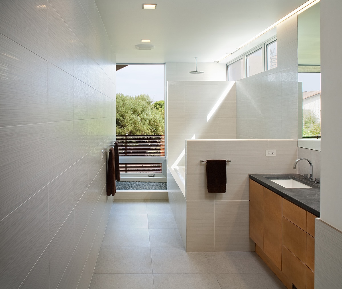 This beautiful fixed- and hinged-window combo in the bathroom lets in tons of natural San Diego light.