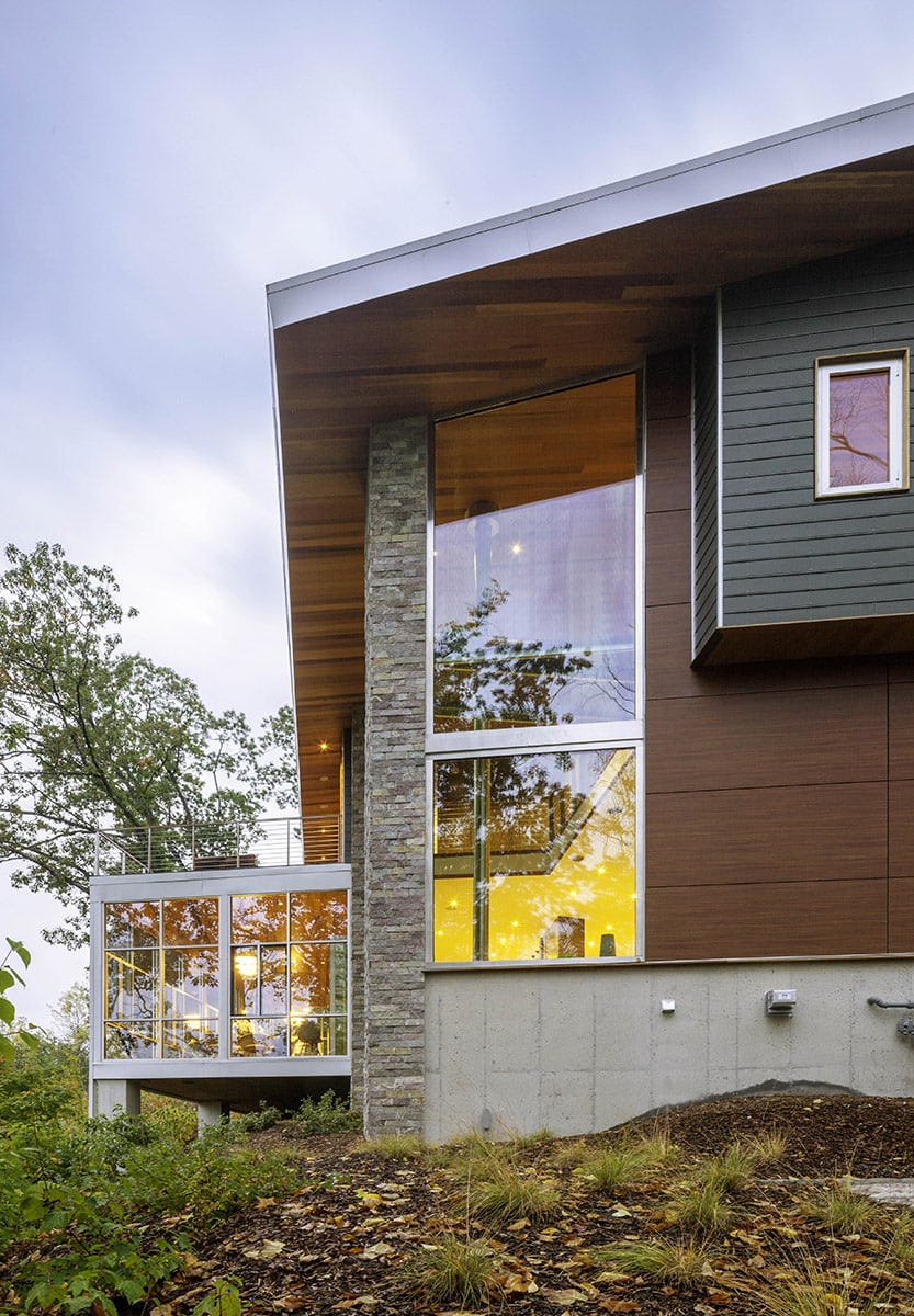 An outside view of fixed and an operable window that connects the home’s interior with the landscape.