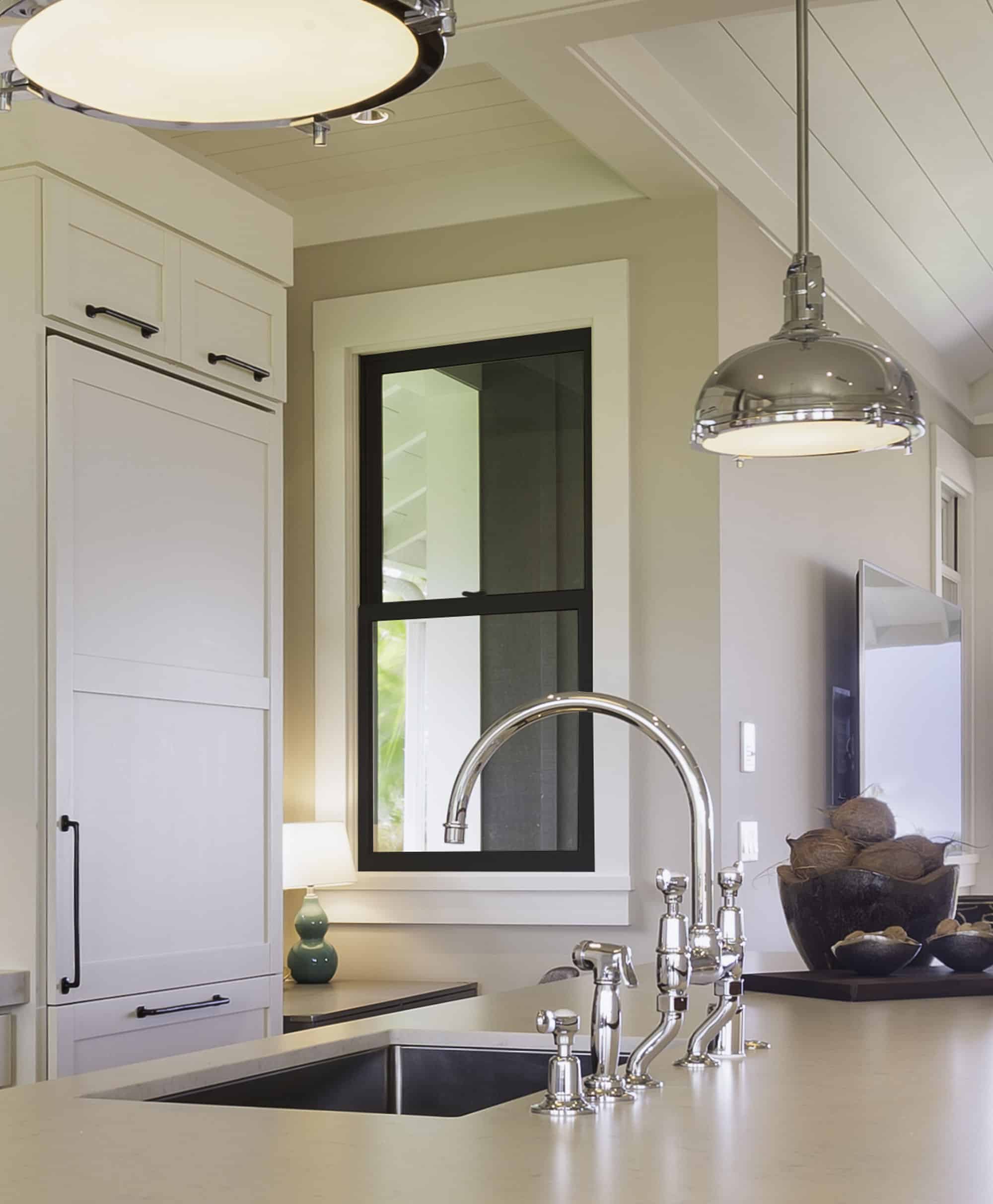 A single-hung window in a kitchen.