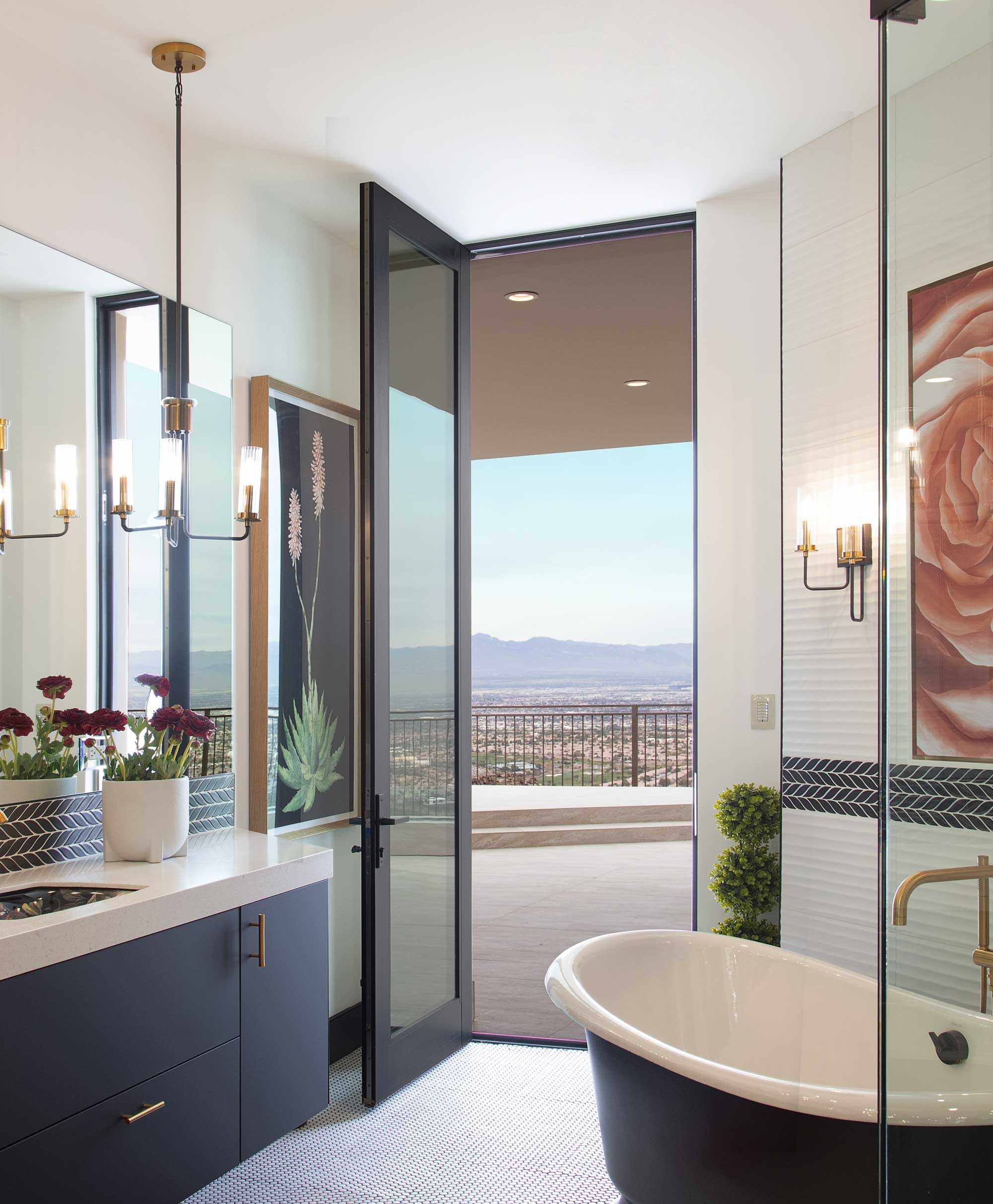A large hinged door opens the bathroom to a balcony.
