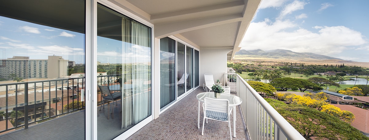 The wall-length sliding doors completely connect rooms to their balcony.