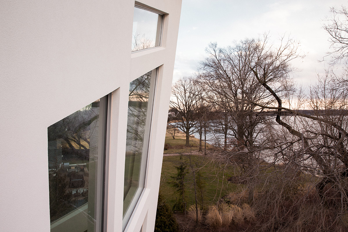 A view of the design and placement of windows throughout the home that offers various views of the South River.