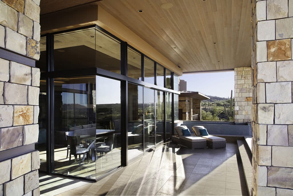 Architect Jessica Hutchison-Rough used large glass panes with butt-glazed corners to achieve unobstructed views in this Arizona home.