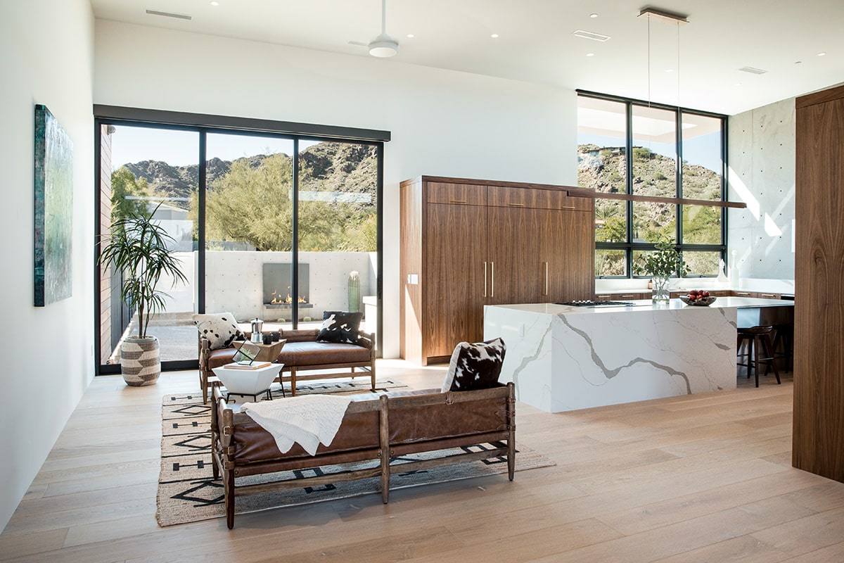 Moving glass walls and windows provide panoramic views of the Sonoran Desert from the kitchen and living room.