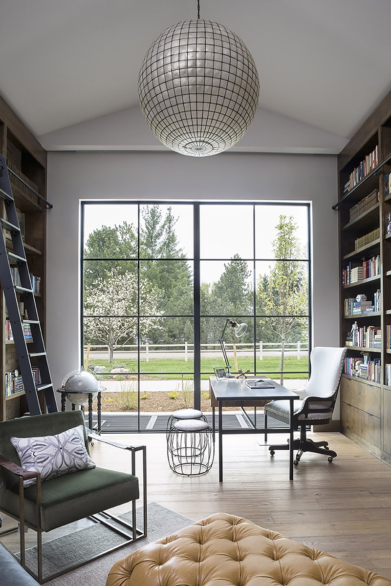 The library, with its 10-by-10-foot window wall, is the centerpiece of the home.