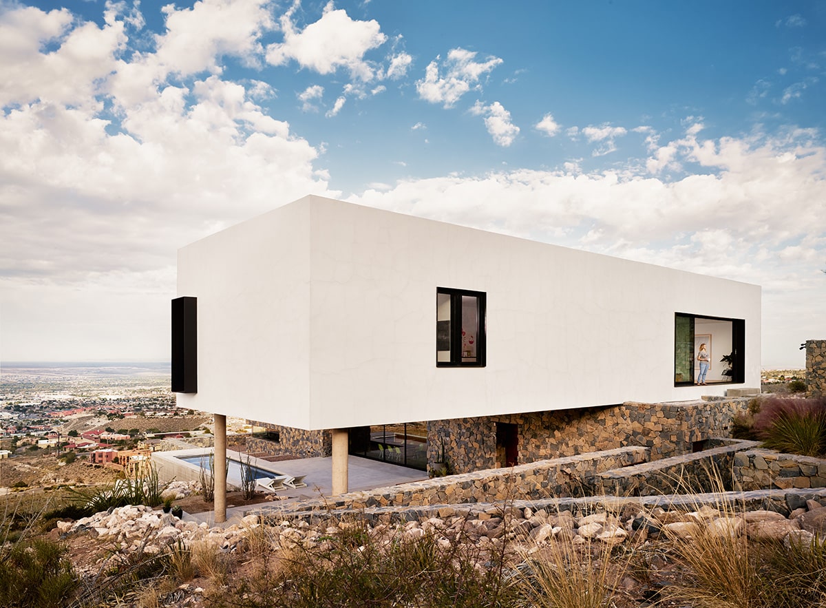 The upper-volume living quarters feature unparalleled views of El Paso and Ciudad Juarez, Mexico, in the distance.