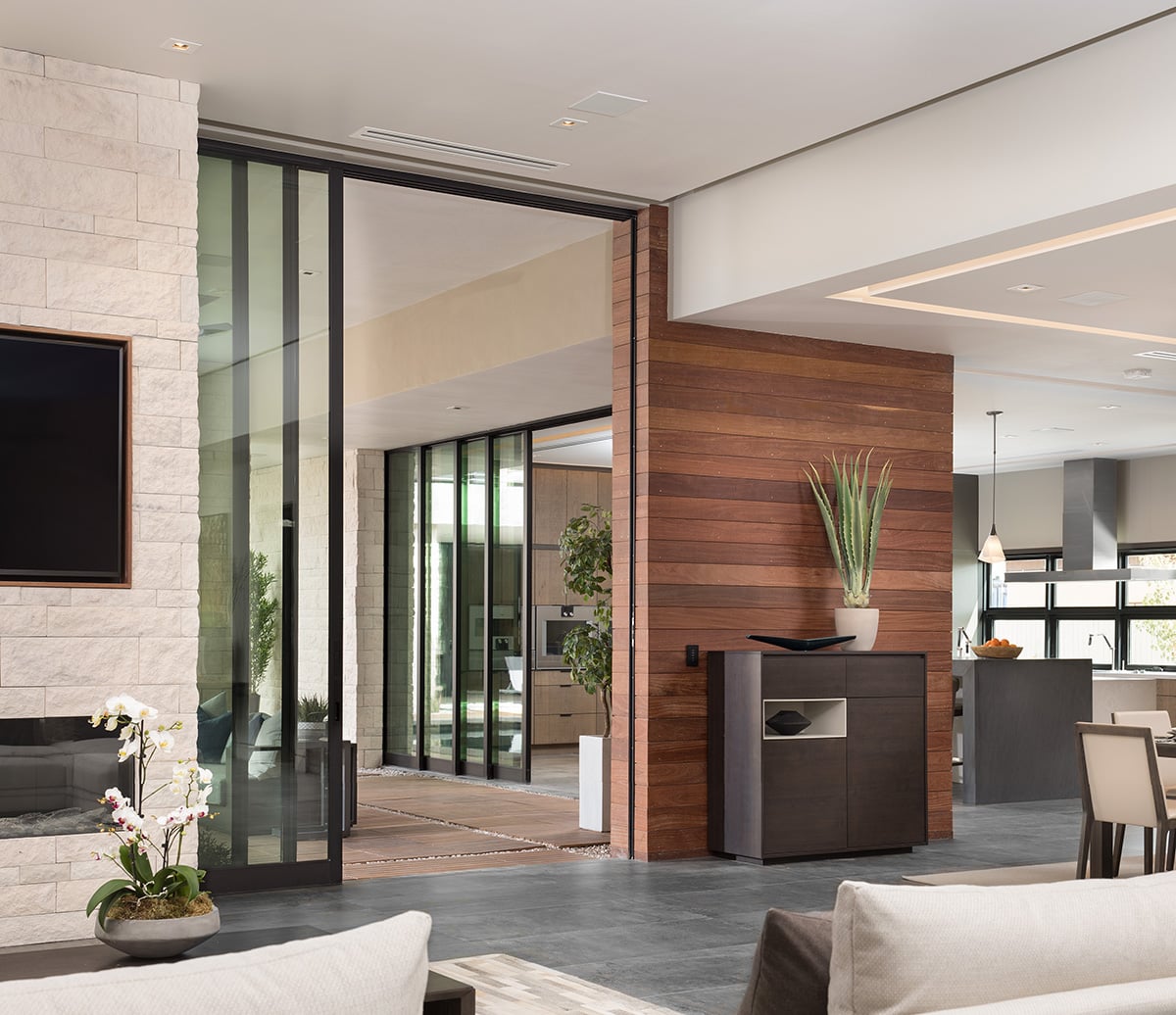 Thanks to Western Window Systems’ Series 900 Multi-Slide Door, the home’s indoor and outdoor living areas all convert into one seamless space.
