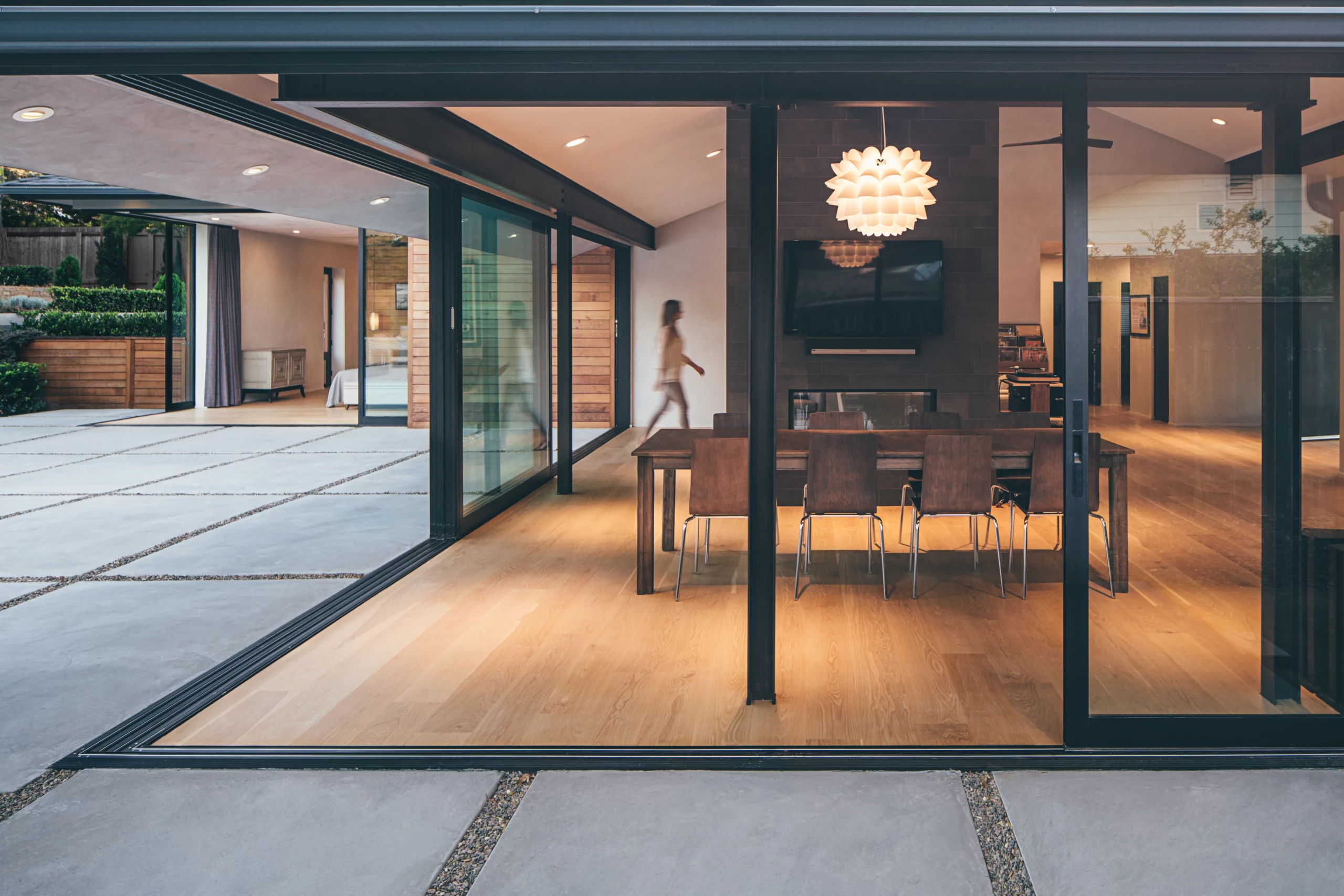 When open, the main living area's multi-slide doors let the perfect weather of Santa Barbara into the home.