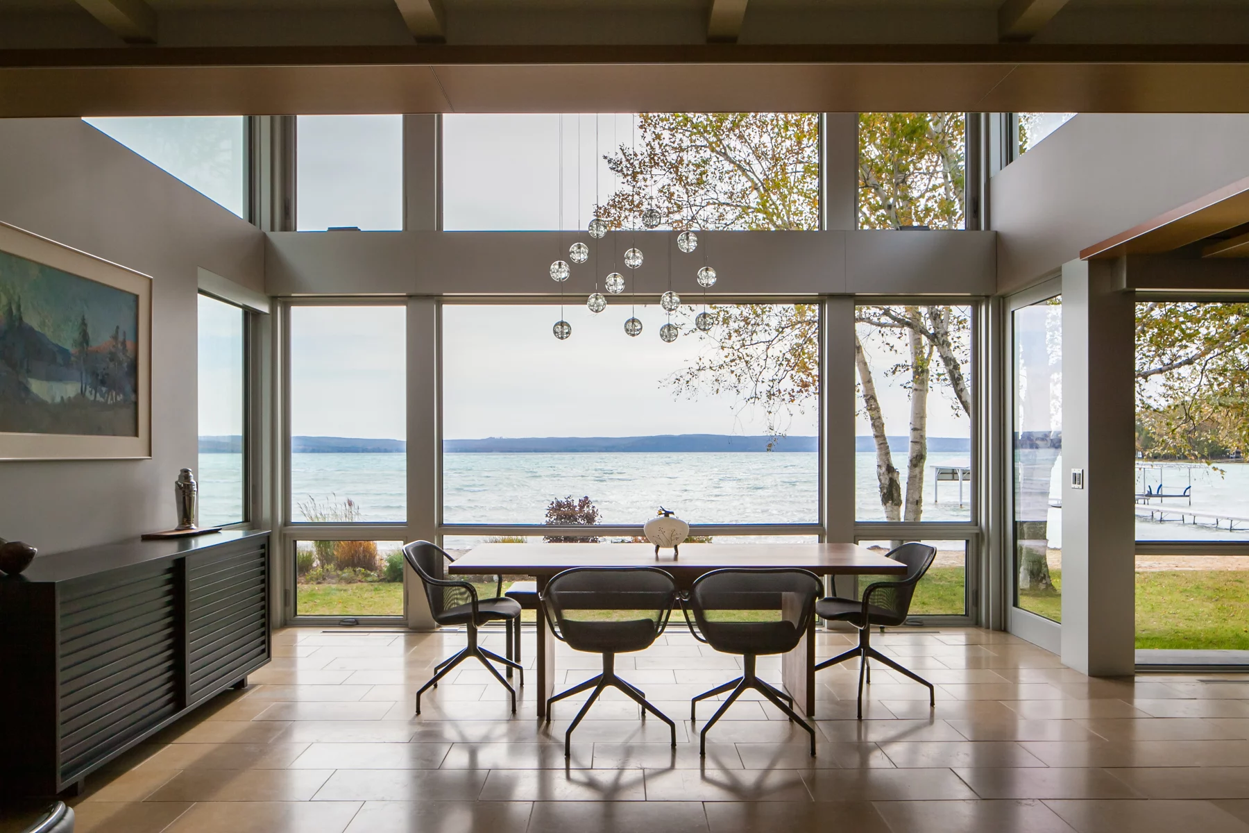This 1,000-square-foot addition to the home frames stunning views of Glen Lake in northern Michiganin the dining area and other rooms.