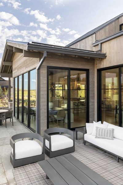 Fixed windows eliminate the barrier to the outdoor patio views.
